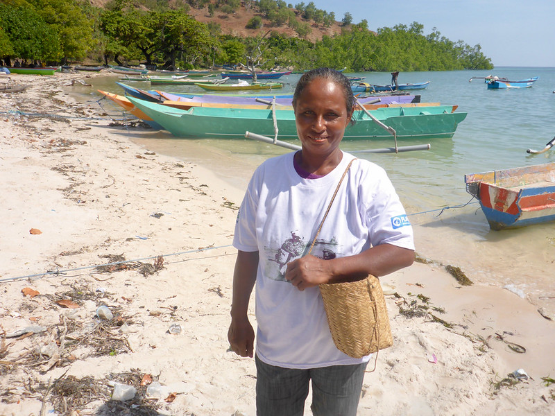 Otilda Souza goes gleaning at the beach next to Beacou village on the north coast of Timor-Leste.