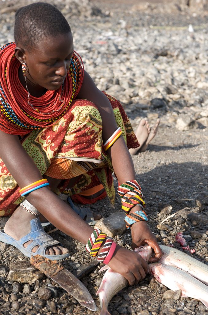 Lake Turkana Cleaning Fish. Photo by Patrick Dugan.