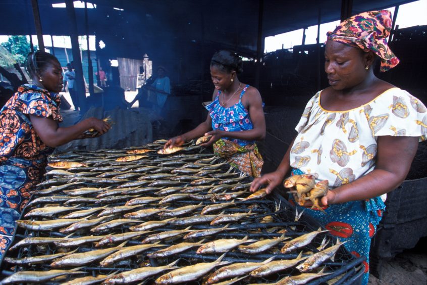 Women fish processors in Ghana. Photo supplied by Minkoh.