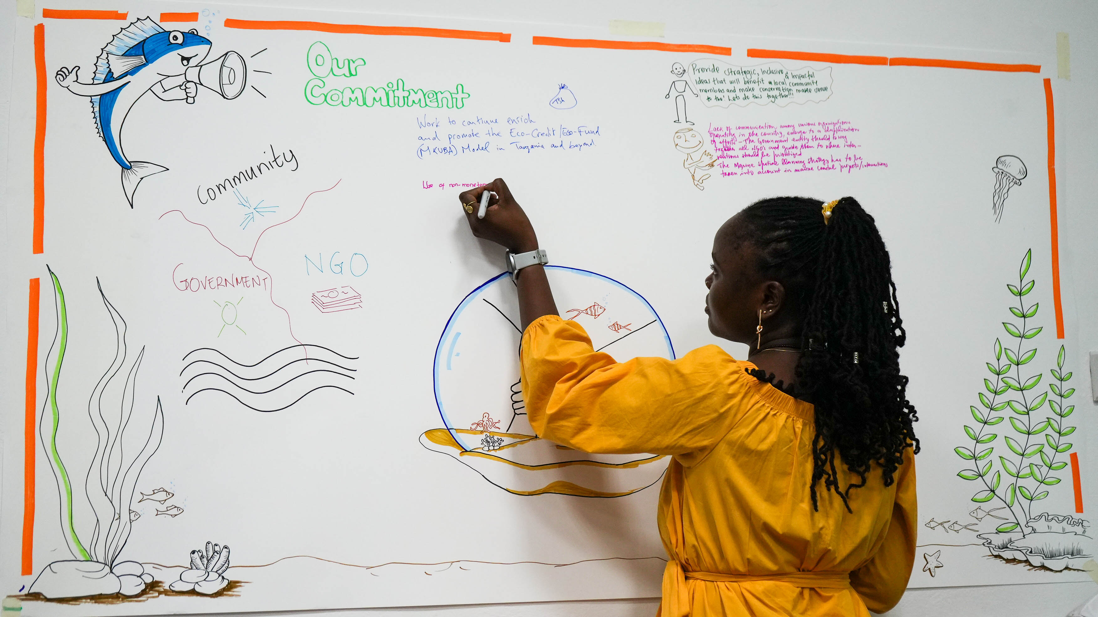 A session participant makes commitments to advance coastal stewardship in the Western Indian Ocean.