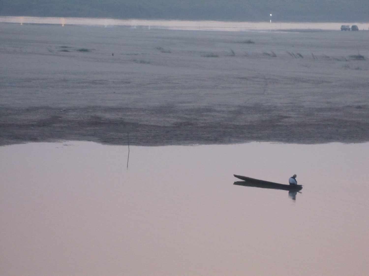A lone fisherman on the Mekong River in Vientiane, Laos.  Photo credit: A. Lynch, USGS.