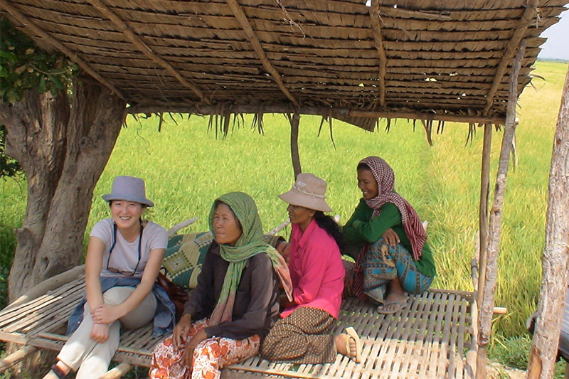 Yumiko in Kampong Chhnang province, Cambodia in 2006 talking to some local women.