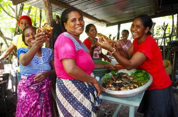Fisher Margarida da Costa prepares her fish to be sold in the nation’s capital, Dili. Photo by Kate Bevitt.