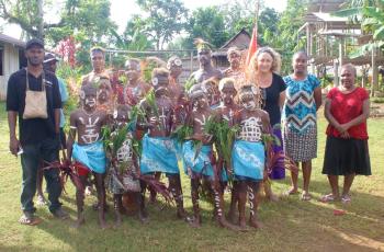 Anouk Ride together with the Provincial Fisheries Office staff and cultural dance performers at the opening of a community-based resource management plan review workshop in Adadaitolo, North Malaita. Photo by Anouk Ride. 