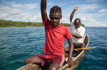 Men prepare to drop their fishing lines, Santupaele village, Western Province, Solomon Islands. Photo by Filip Milovac.