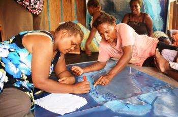The voices of women are often underrepresented in decisions on resource management. Photo by Jan van der Ploeg