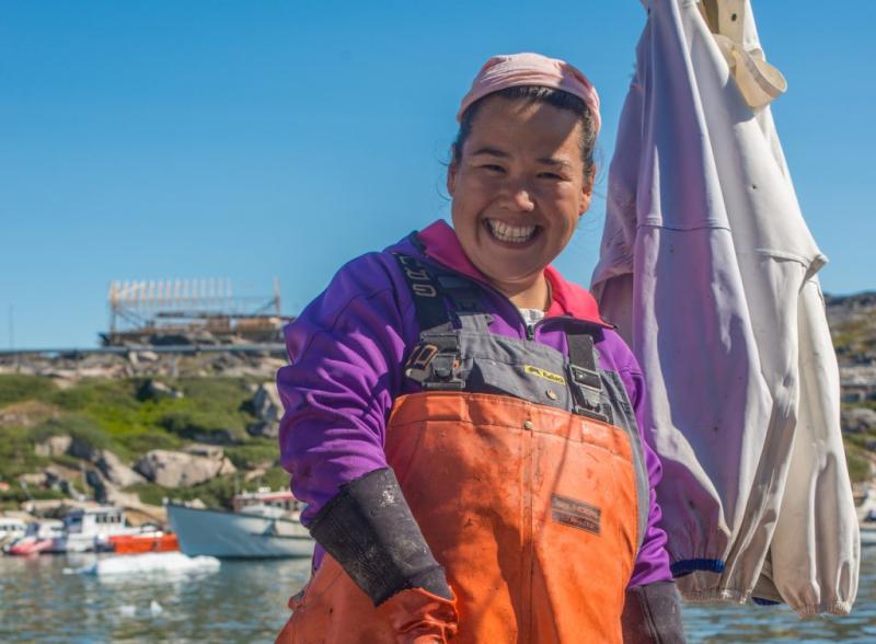 Photo of Greenlandic woman landing Greenland halibut (Reinhardtius hippoglossoides) in Ilulissat, Greenland. Photo by Hunter T. Snyder.