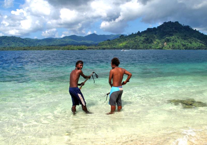 Youth preparing to go spear fishing in Jorio, Western Province, Solomon Islands. Photo by Pip Cohen, 2010.