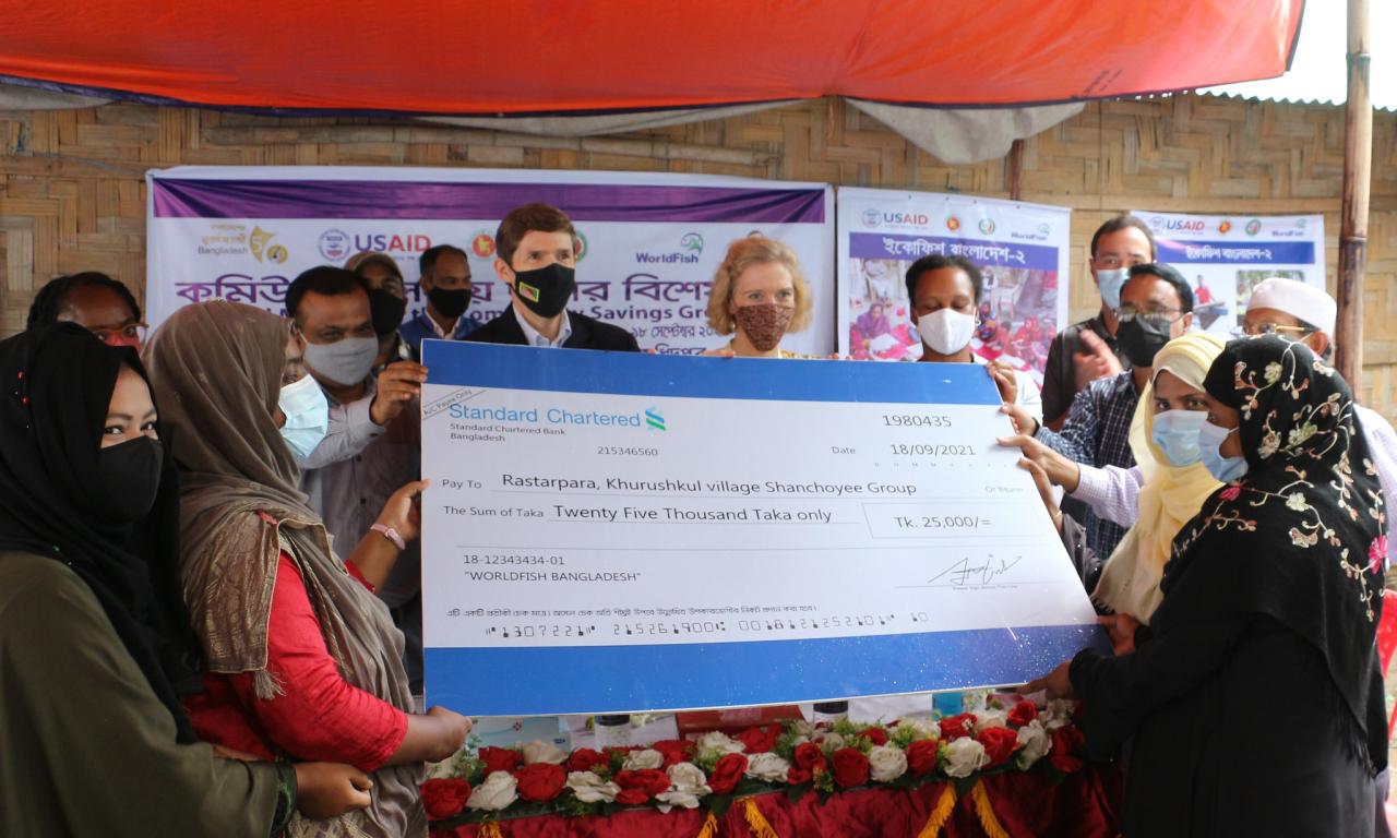 Community savings groups (CSG) receive matching grants. Photo by Md. Asaduzzaman