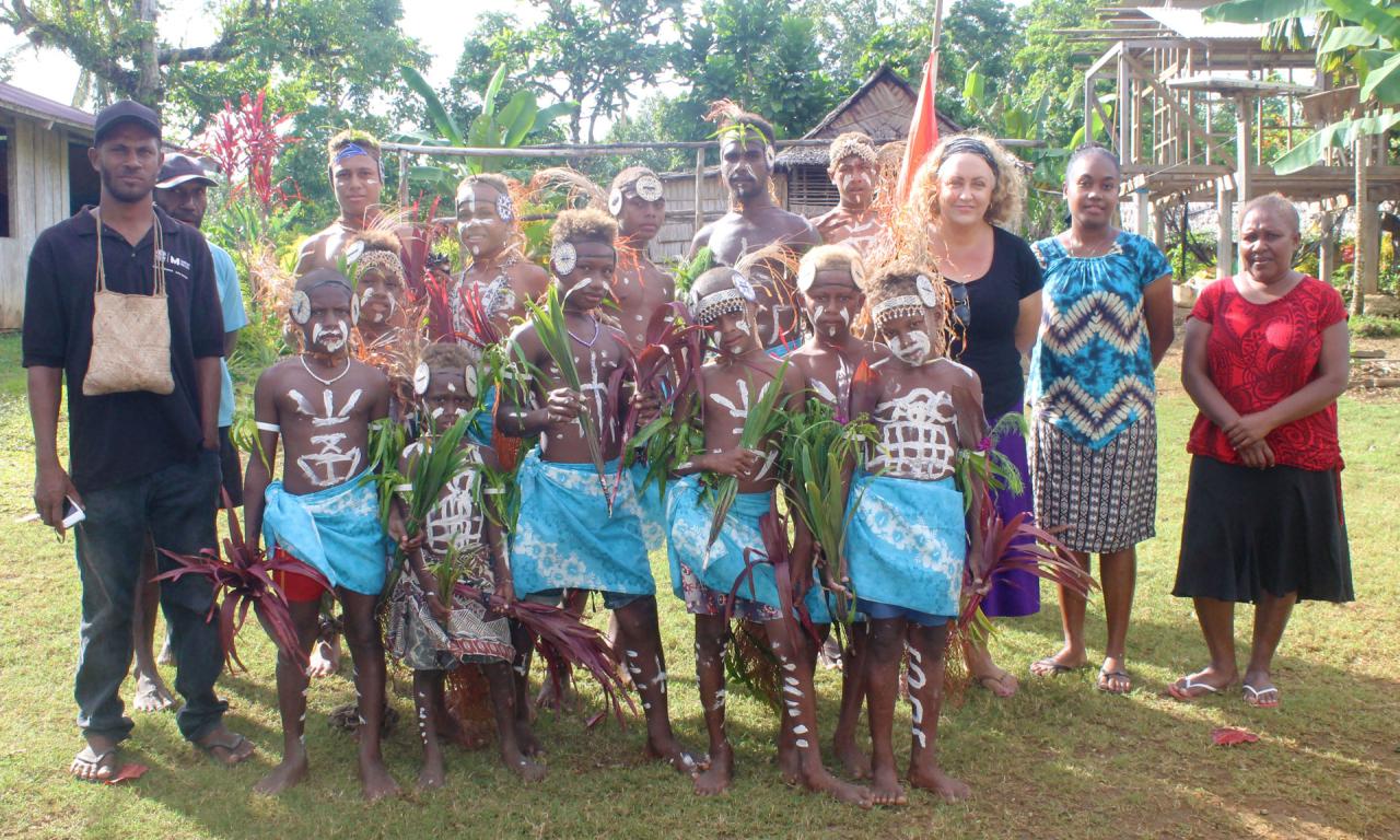 Anouk Ride together with the Provincial Fisheries Office staff and cultural dance performers at the opening of a community-based resource management plan review workshop in Adadaitolo, North Malaita. Photo by Anouk Ride.
